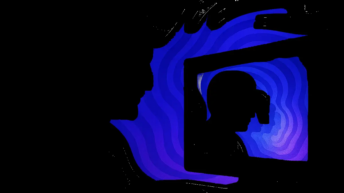 Primo piano di una persona che guarda uno schermo luminoso